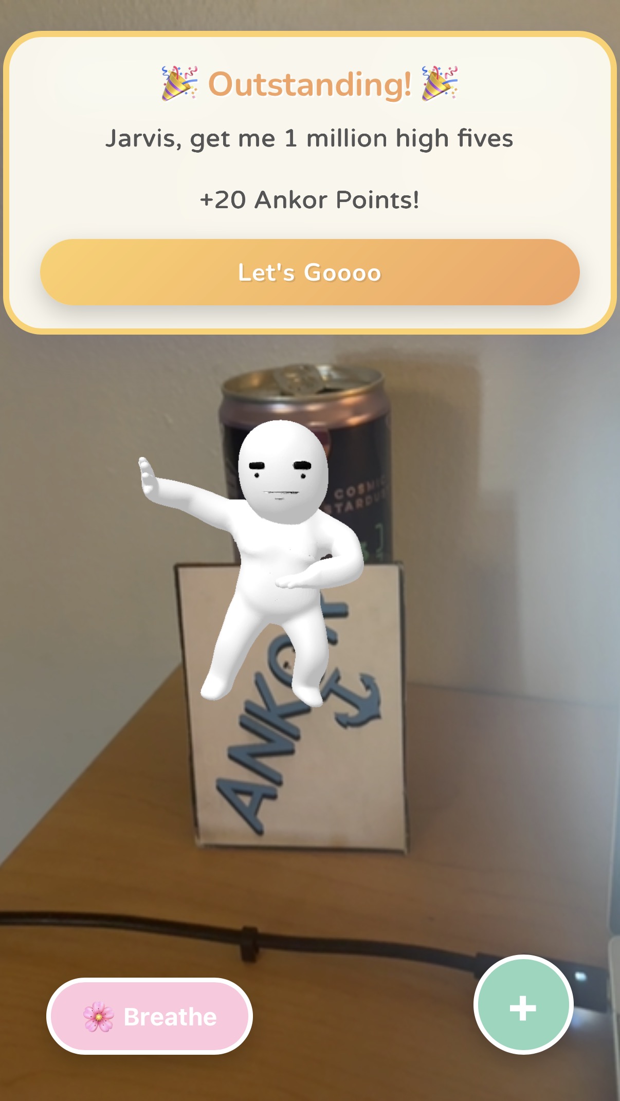 AR Outstanding popup awarding plus 20 Ankor Points above the dancing white mascot on its box.