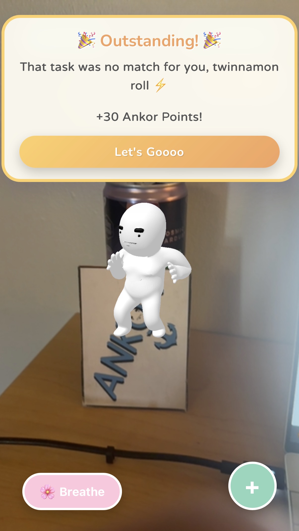 AR Outstanding popup awarding plus 30 Ankor Points above the white mascot on its box.